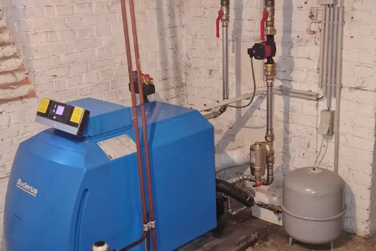 Système de chauffage à mazout Buderus performant installé à Rixensart, Brabant wallon.